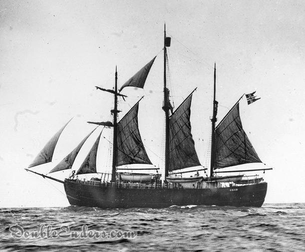 three-masted gaff-rigged ship under sail